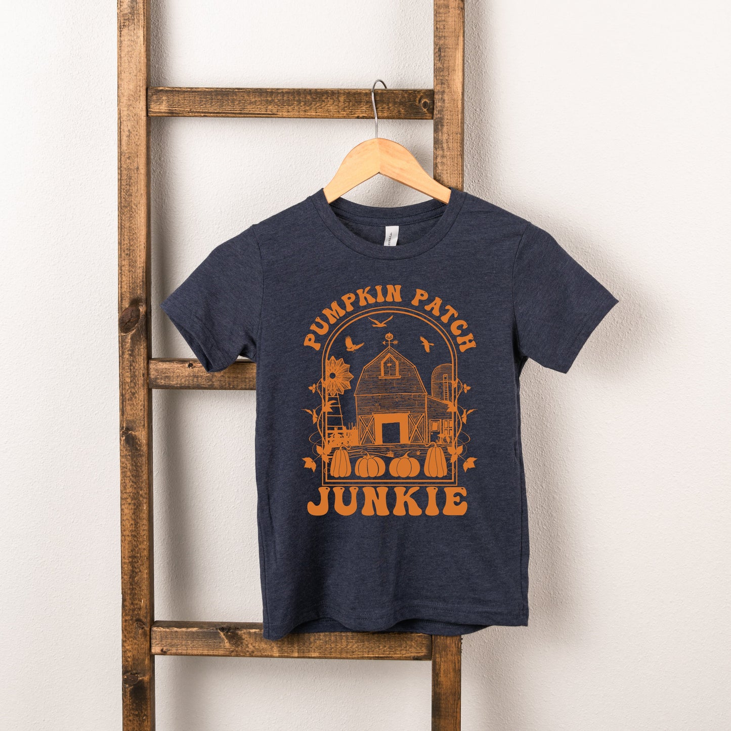 Pumpkin Patch Junkie | Youth Graphic Short Sleeve Tee by The Juniper Shop