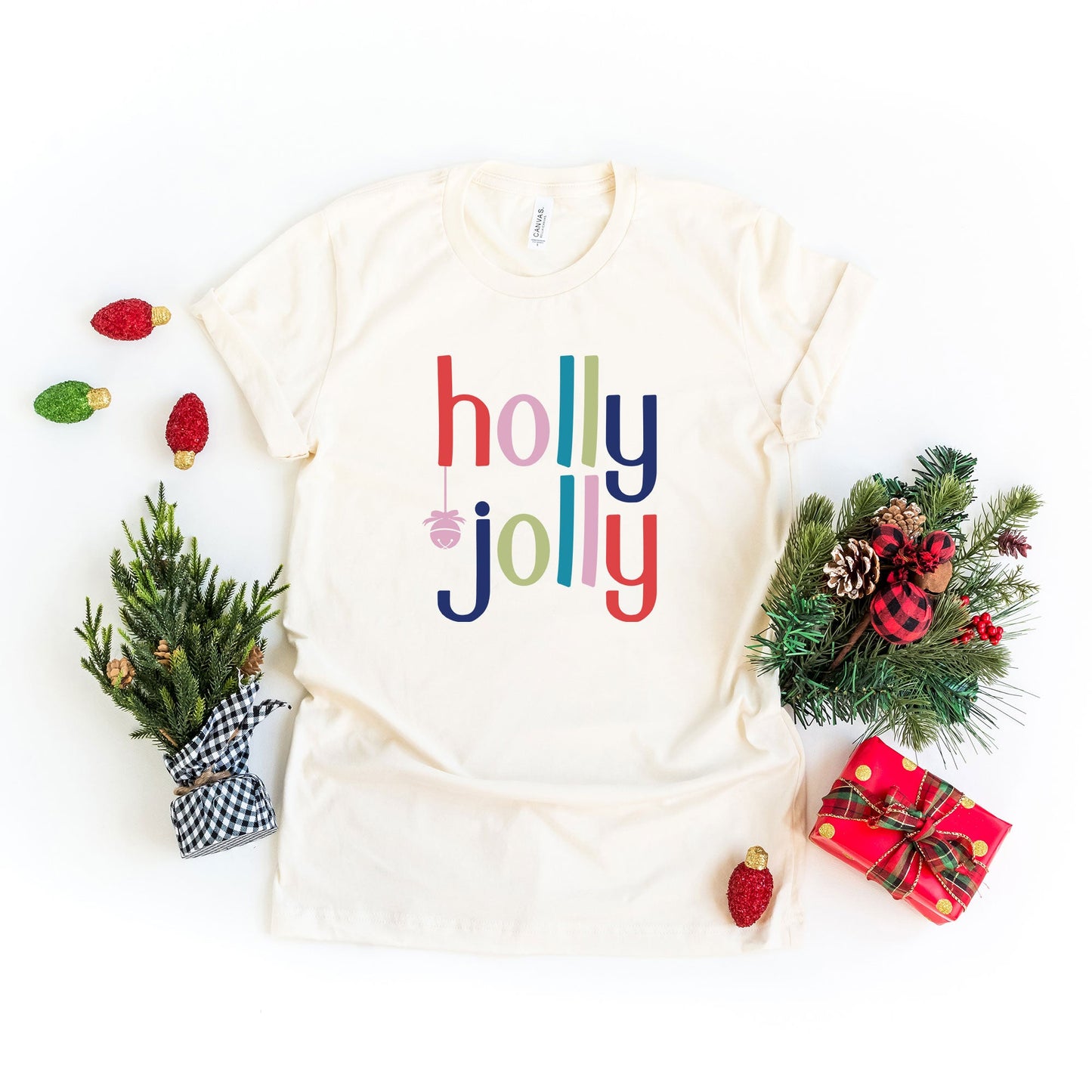 Holly Jolly | Youth Graphic Short Sleeve Tee by The Juniper Shop