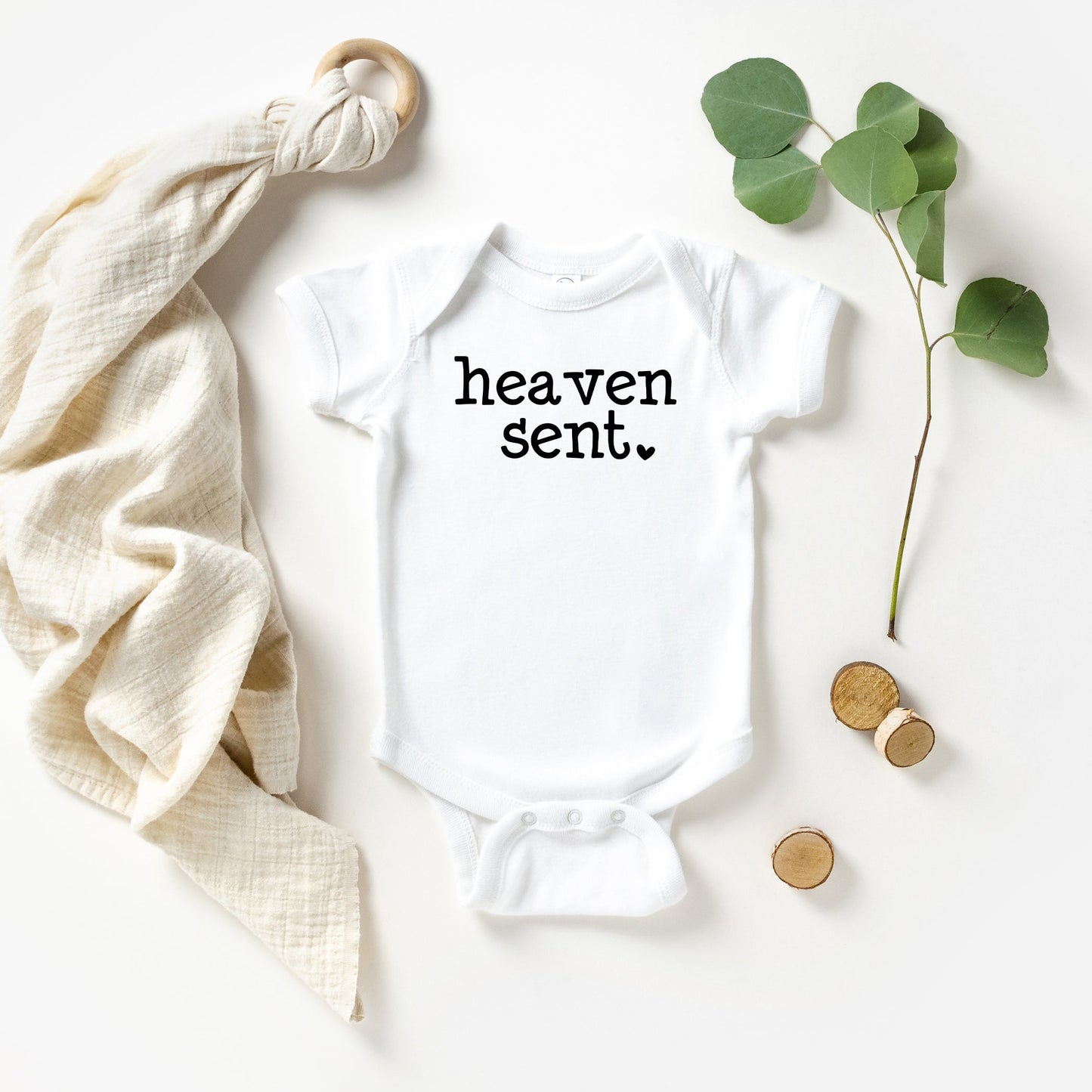 Heaven Sent Heart | Baby Graphic Short Sleeve Onesie by The Juniper Shop