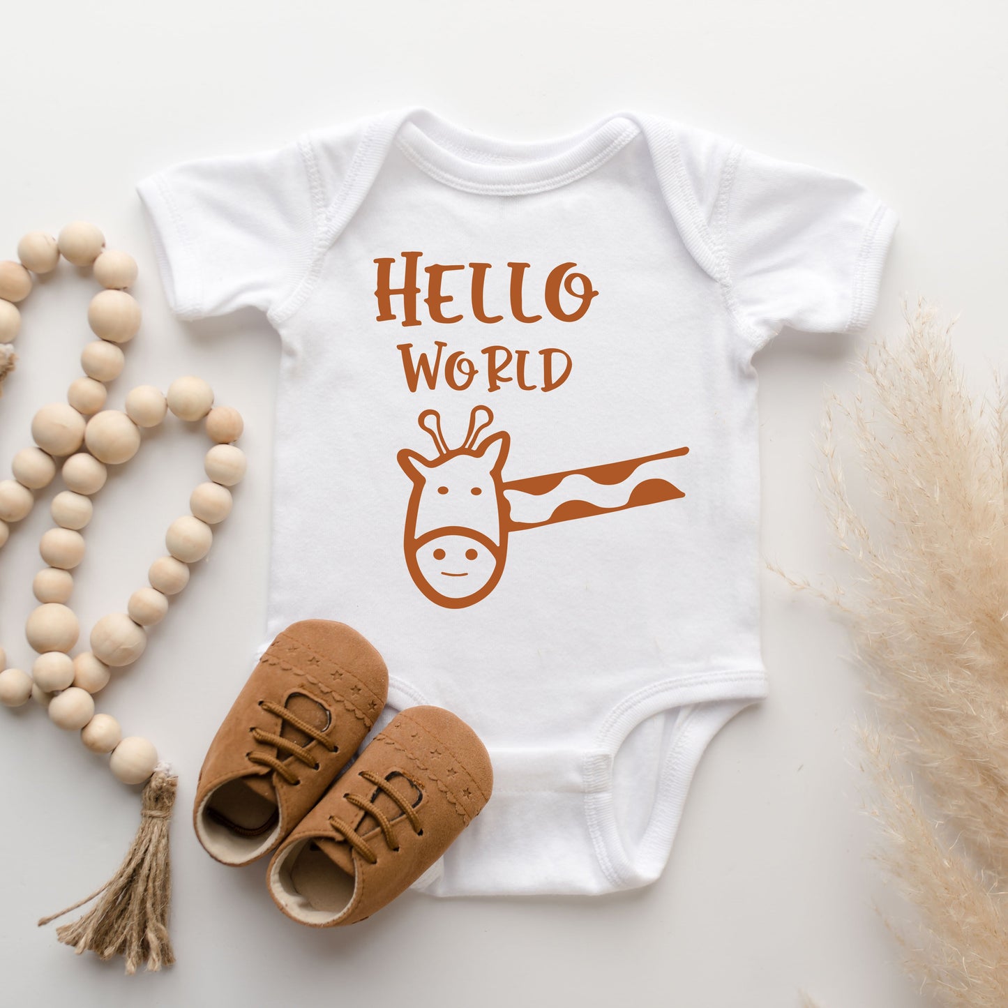 Hello World Giraffe | Baby Graphic Short Sleeve Onesie by The Juniper Shop