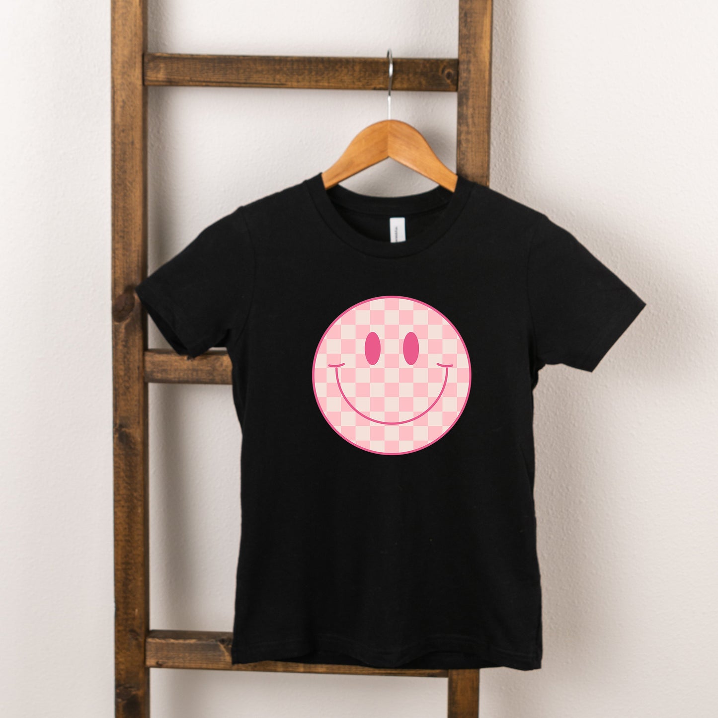 Pink Checker Smiley Face | Toddler Short Sleeve Crew Neck by The Juniper Shop