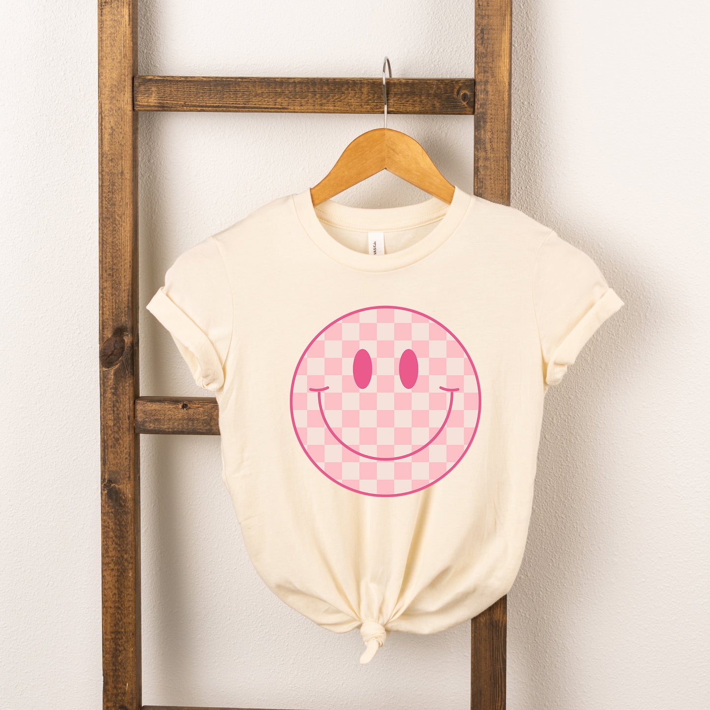 Pink Checker Smiley Face | Toddler Short Sleeve Crew Neck by The Juniper Shop