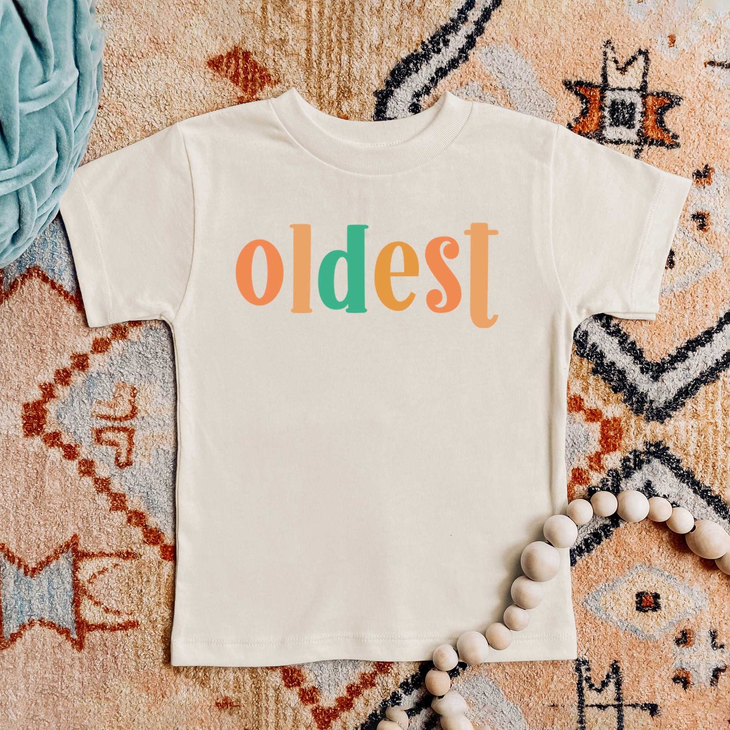 Oldest Colorful | Toddler Graphic Short Sleeve Tee by The Juniper Shop