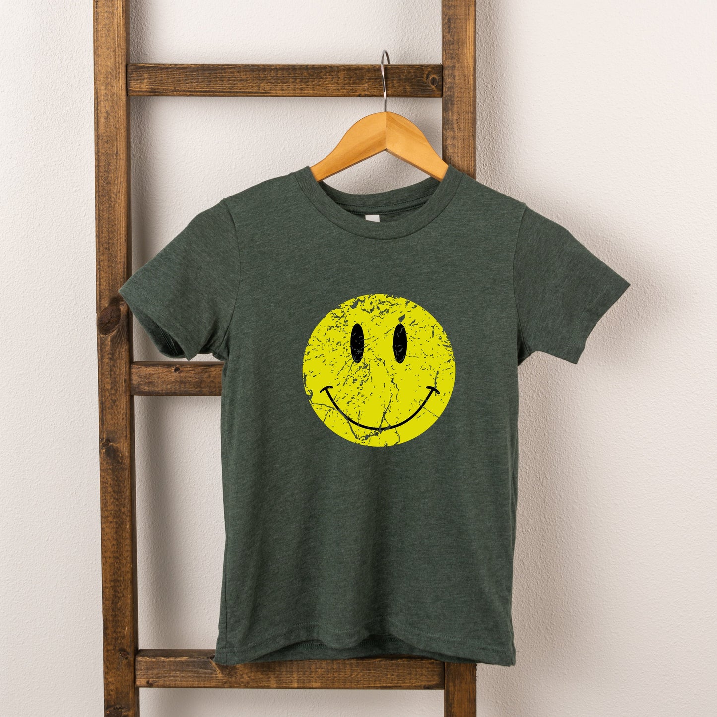 Distressed Smiley Face | Toddler Graphic Short Sleeve Tee by The Juniper Shop