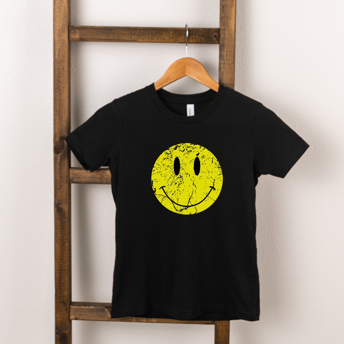 Distressed Smiley Face | Toddler Graphic Short Sleeve Tee by The Juniper Shop