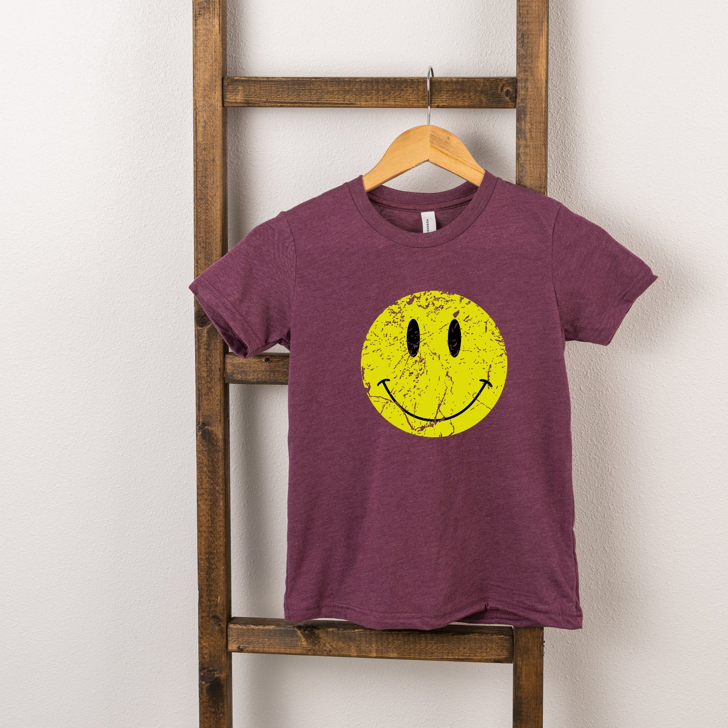 Distressed Smiley Face | Toddler Graphic Short Sleeve Tee by The Juniper Shop