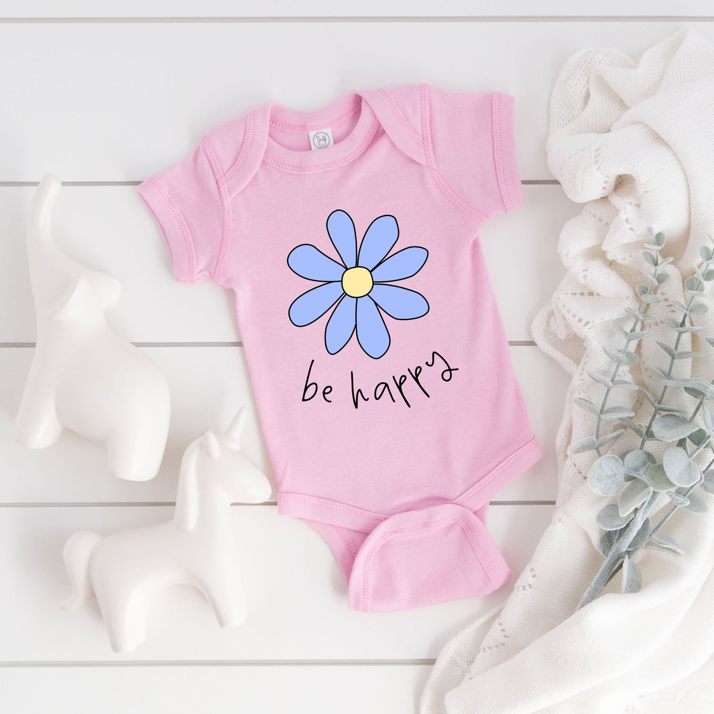 Be Happy Flower | Baby Graphic Short Sleeve Onesie by The Juniper Shop