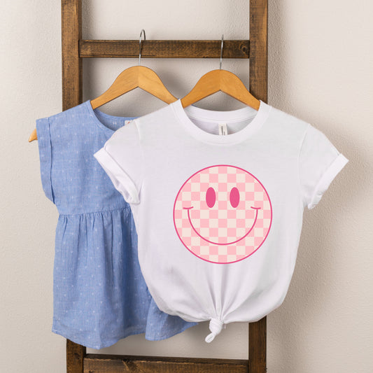 Pink Checker Smiley Face | Toddler Short Sleeve Crew Neck by The Juniper Shop