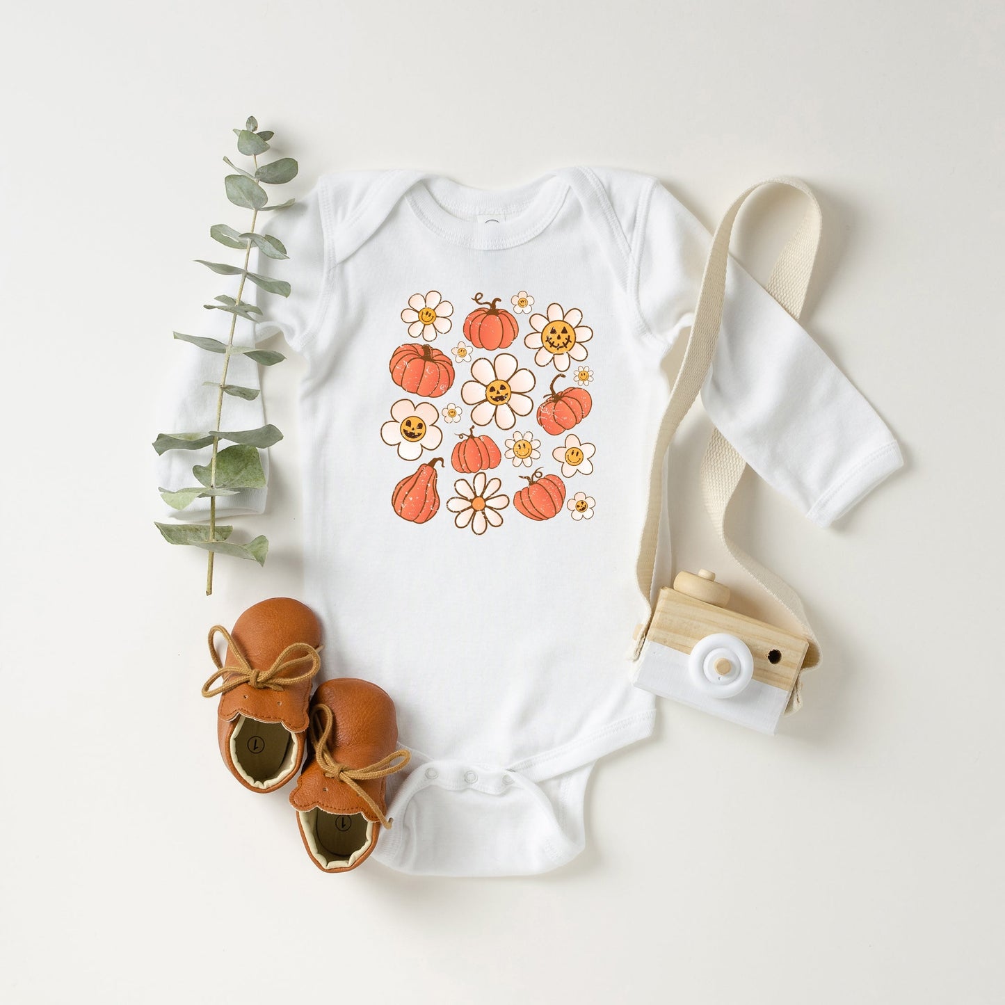 Distressed Flowers And Pumpkins | Baby Long Sleeve Onesie by The Juniper Shop