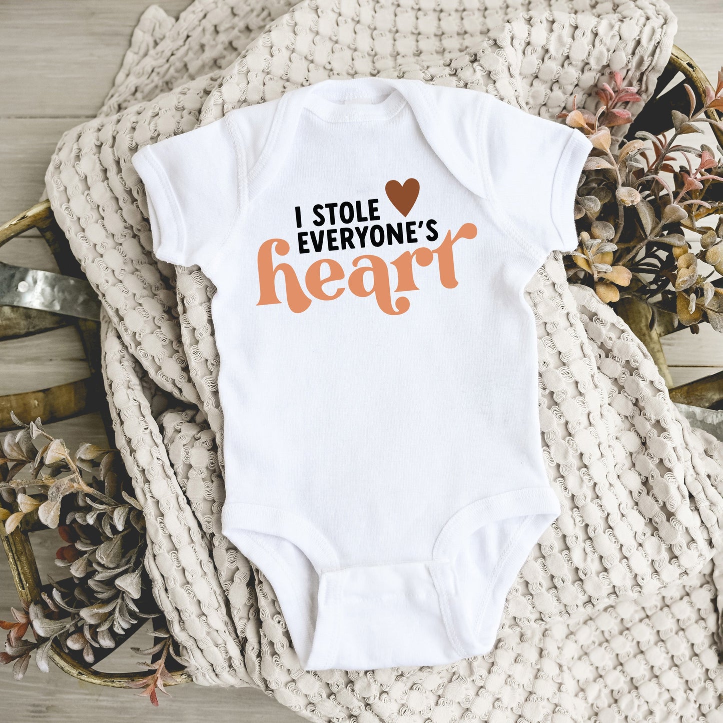 I Stole Everyones Heart | Baby Graphic Short Sleeve Onesie by The Juniper Shop