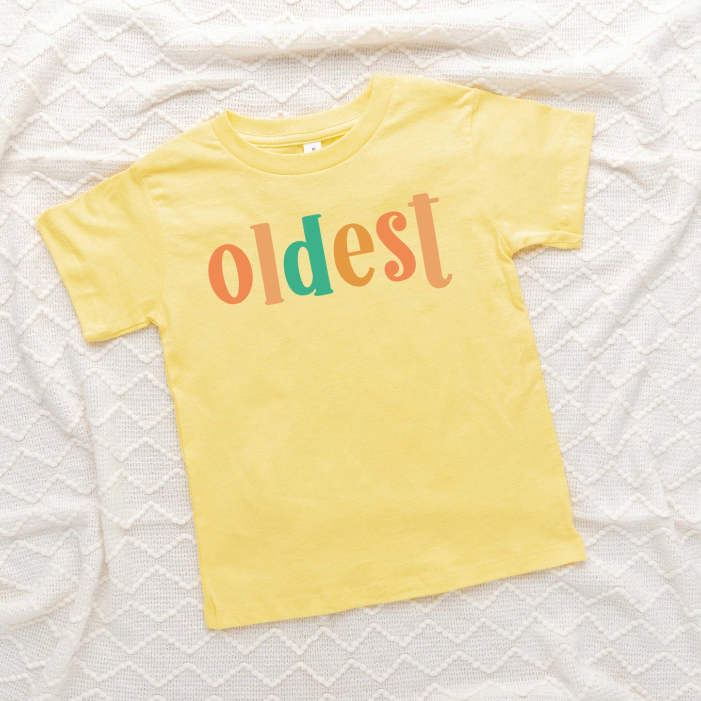 Oldest Colorful | Toddler Graphic Short Sleeve Tee by The Juniper Shop